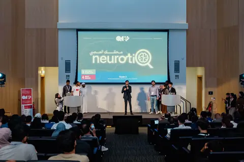 Presenting on stage at the NYUAD hackathon